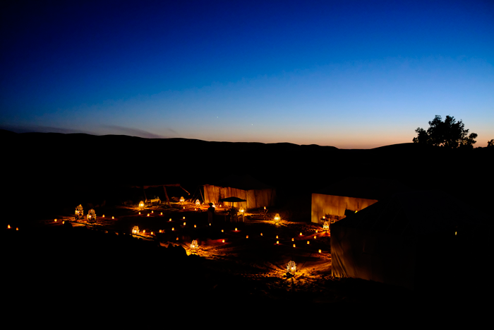Luxury desert camp under starry sky